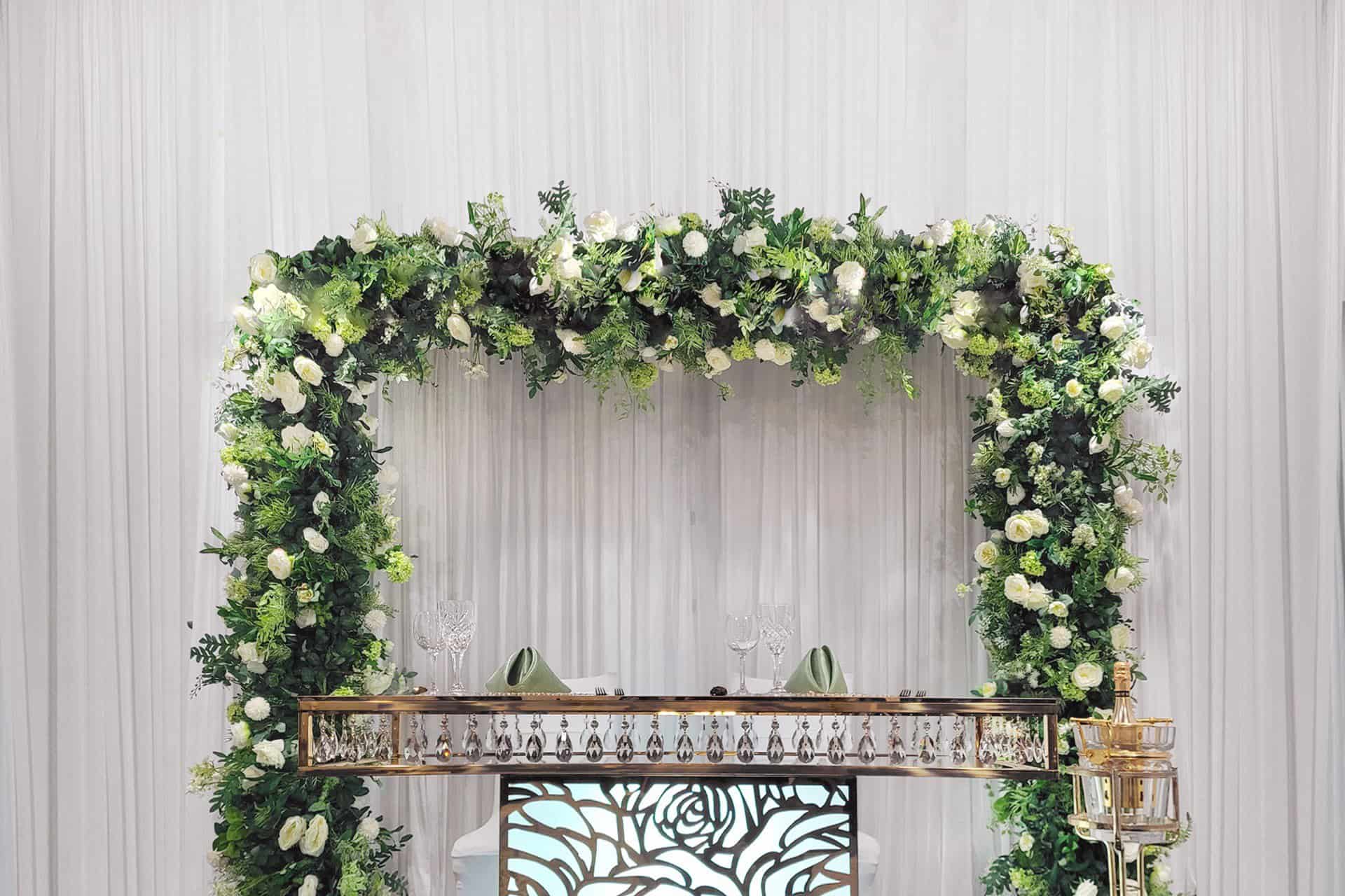 Flower Arch Backdrop is a Stand that Helps Frame Photos... Rent + DIY